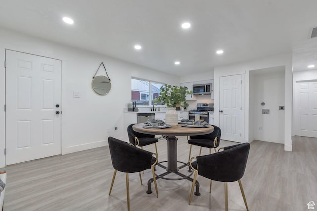 4165 W 4715 S, Kearns, UT 84118 - dining area featuring baseboards, visible vents, recessed lighting, and light wood-style floors