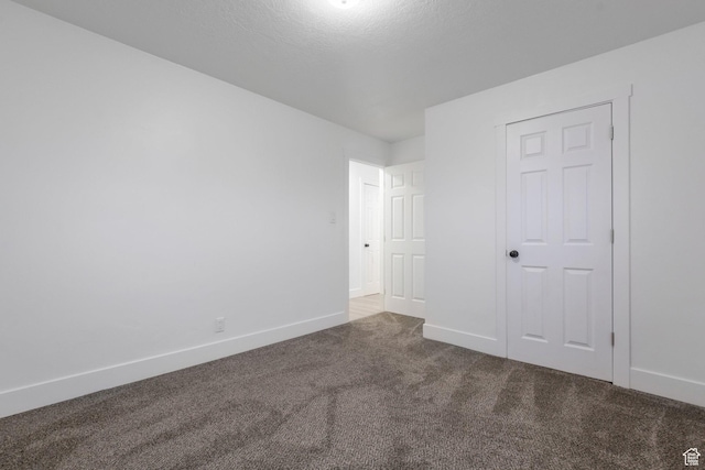 4165 W 4715 S, Kearns, UT 84118 - unfurnished bedroom featuring carpet and baseboards