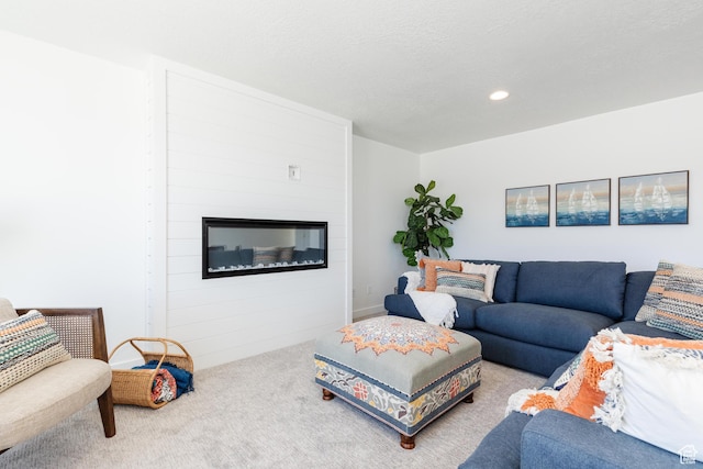 526 N Richland Valley St Unit 10, Garden City, UT 84028 - living room featuring a large fireplace, recessed lighting, and carpet
