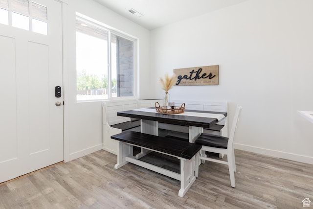 526 N Richland Valley St Unit 10, Garden City, UT 84028 - dining room featuring baseboards, visible vents, and light wood finished floors