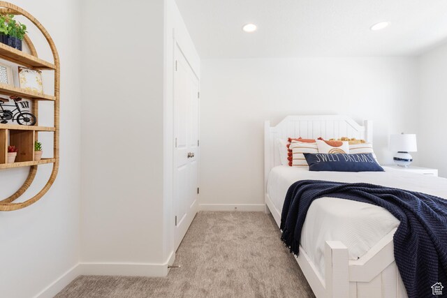 526 N Richland Valley St Unit 10, Garden City, UT 84028 - bedroom featuring baseboards, recessed lighting, and light colored carpet