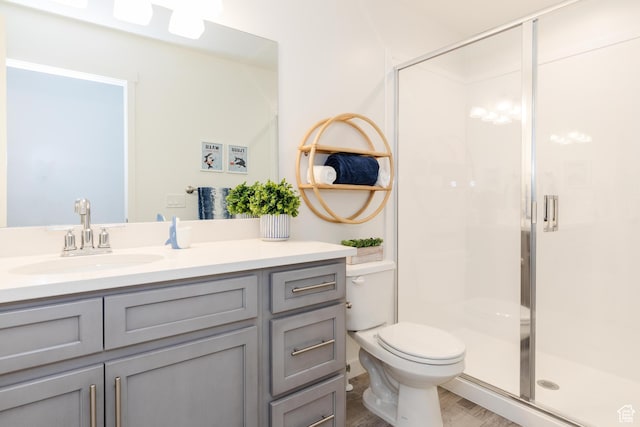 526 N Richland Valley St Unit 10, Garden City, UT 84028 - full bathroom featuring a stall shower, toilet, and vanity
