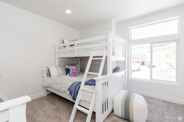 526 N Richland Valley St Unit 10, Garden City, UT 84028 - bedroom with carpet, multiple windows, and baseboards