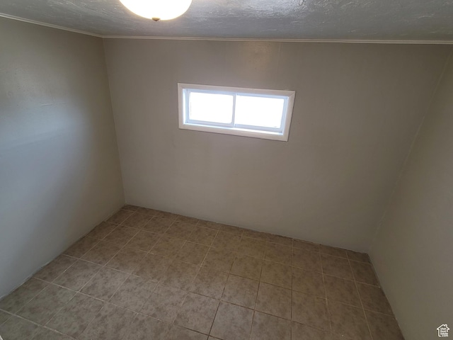 250 8th St, Wendover, UT 84083 - empty room with a textured ceiling and crown molding
