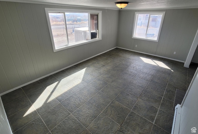 250 8th St, Wendover, UT 84083 - unfurnished bedroom featuring baseboards and a textured ceiling