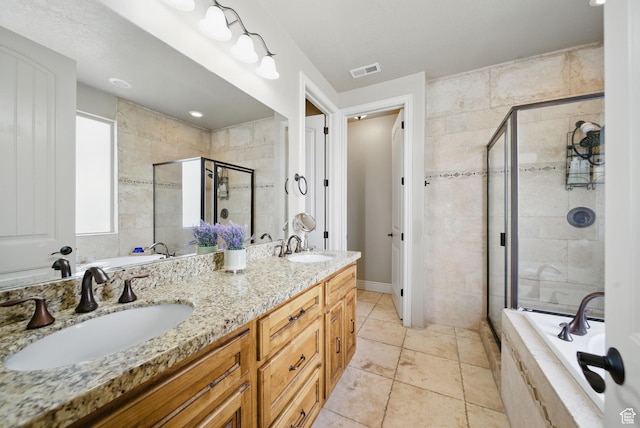 1637 E 2400 N, Layton, UT 84040 - full bath featuring a sink, a stall shower, a garden tub, and visible vents