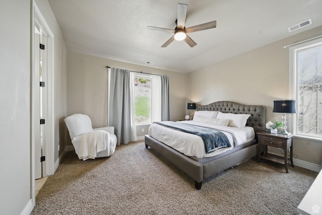 1637 E 2400 N, Layton, UT 84040 - carpeted bedroom featuring baseboards, visible vents, and a ceiling fan