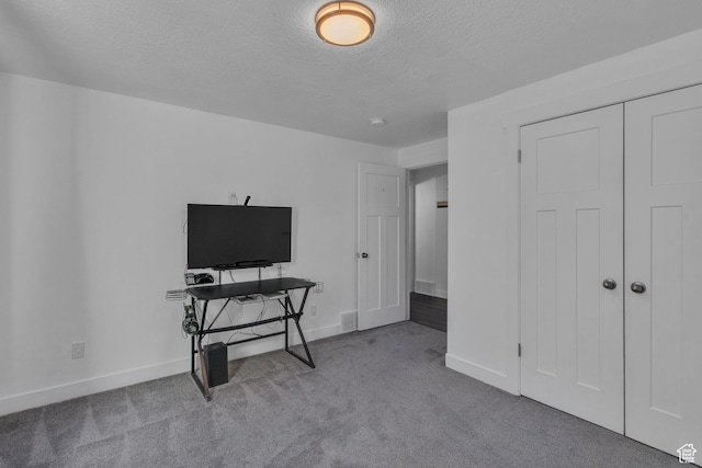 3457 W Blue Crane Dr N, Clinton, UT 84015 - carpeted home office with a textured ceiling and baseboards