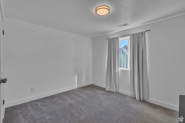 3457 W Blue Crane Dr N, Clinton, UT 84015 - carpeted spare room with a textured ceiling and baseboards