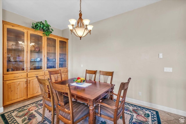 799 N 2600 W, Hurricane, UT 84737 - dining area featuring light tile patterned flooring, baseboards, and a chandelier