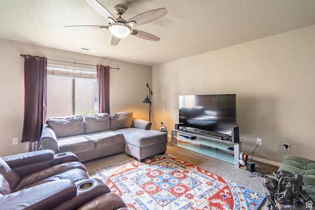 1301 W Indian Hills Dr Unit 59, St George, UT 84770 - carpeted living room featuring visible vents, a textured ceiling, baseboards, and ceiling fan