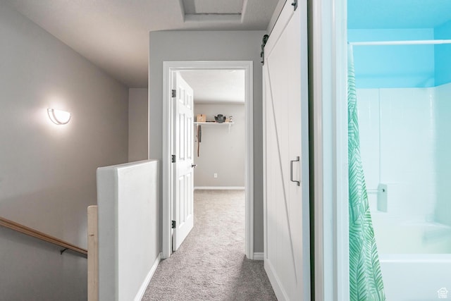 1301 W Indian Hills Dr Unit 59, St George, UT 84770 - corridor with carpet flooring, an upstairs landing, and baseboards