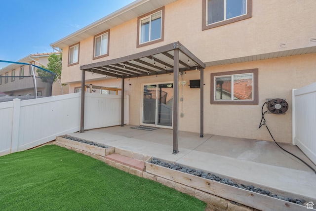 1301 W Indian Hills Dr Unit 59, St George, UT 84770 - rear view of property with stucco siding, fence, and a patio