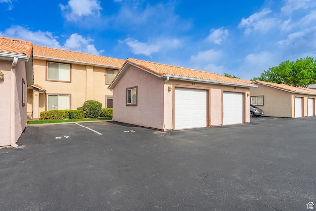 1301 W Indian Hills Dr Unit 59, St George, UT 84770 - garage with uncovered parking