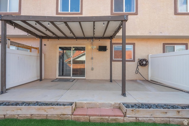 1301 W Indian Hills Dr Unit 59, St George, UT 84770 - entrance to property featuring stucco siding, fence, and a patio