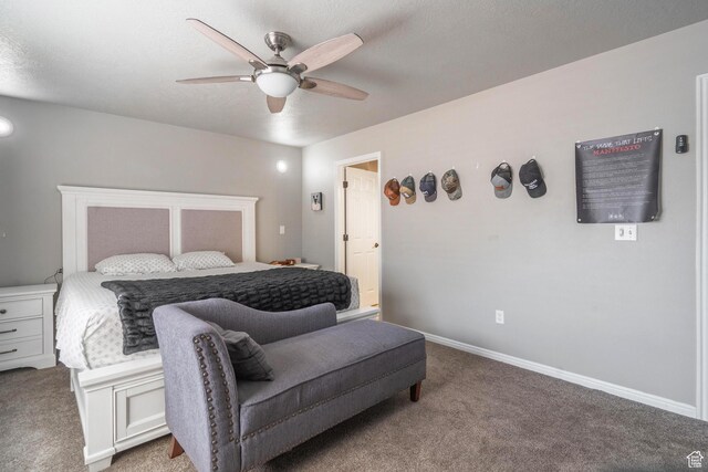 1301 W Indian Hills Dr Unit 59, St George, UT 84770 - carpeted bedroom with baseboards, a textured ceiling, and ceiling fan