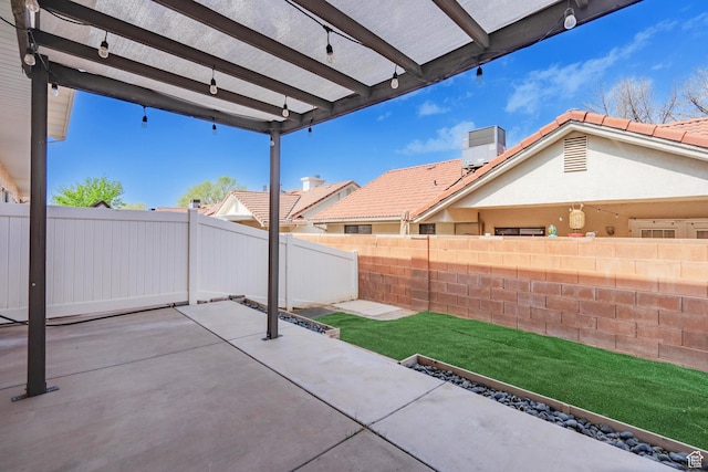 1301 W Indian Hills Dr Unit 59, St George, UT 84770 - view of patio / terrace featuring a fenced backyard and a pergola
