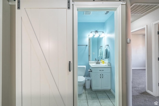 1301 W Indian Hills Dr Unit 59, St George, UT 84770 - bathroom with visible vents, toilet, tile patterned flooring, and vanity
