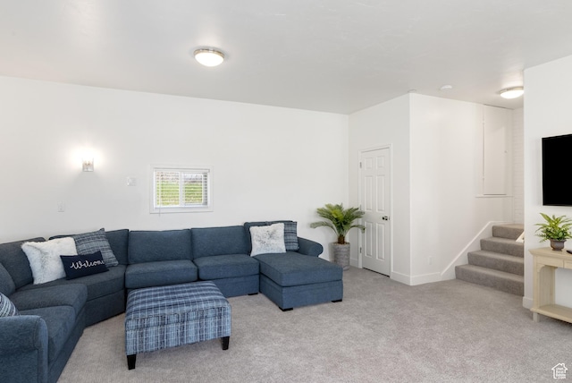 199 N 300 W, Garden City, UT 84028 - living room with baseboards, stairs, and light colored carpet