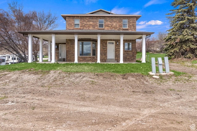 199 N 300 W, Garden City, UT 84028 - view of front of home with covered porch and brick siding