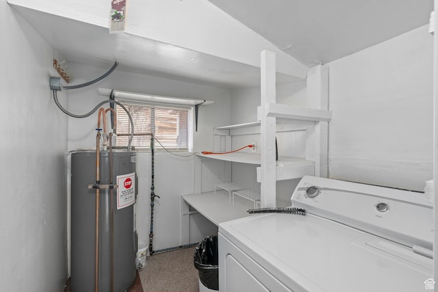 washroom featuring washer / dryer, laundry area, and electric water heater