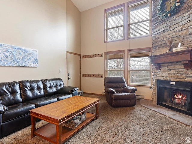 3615 N Wolf Lodge Dr E Unit 109, Eden, UT 84310 - living room with a towering ceiling, carpet floors, a fireplace, and baseboard heating