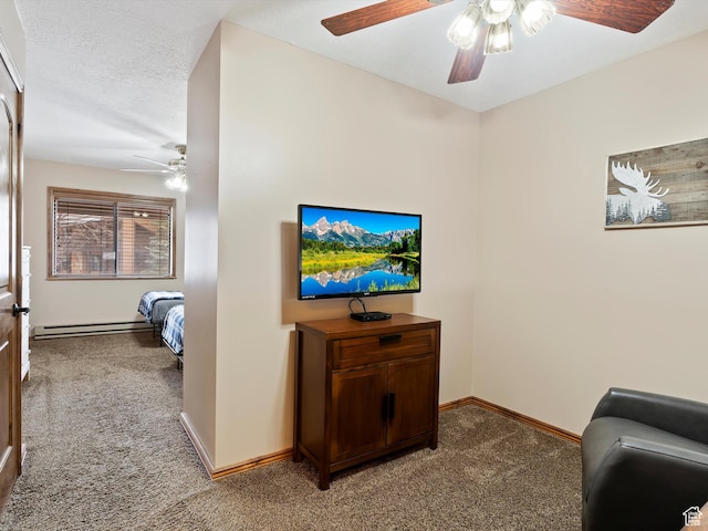 3615 N Wolf Lodge Dr E Unit 109, Eden, UT 84310 - living room with a textured ceiling, baseboards, baseboard heating, a ceiling fan, and light carpet