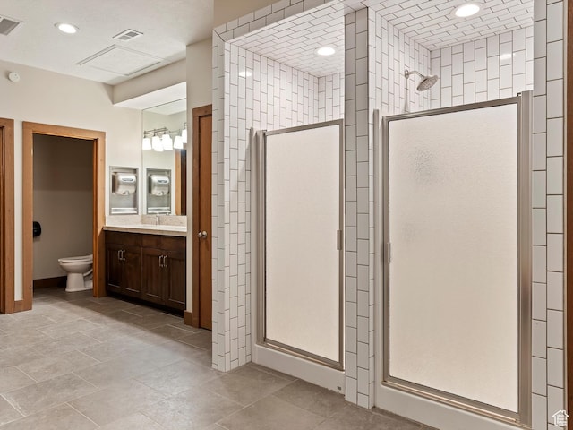 3615 N Wolf Lodge Dr E Unit 109, Eden, UT 84310 - bathroom with vanity, recessed lighting, toilet, a stall shower, and visible vents
