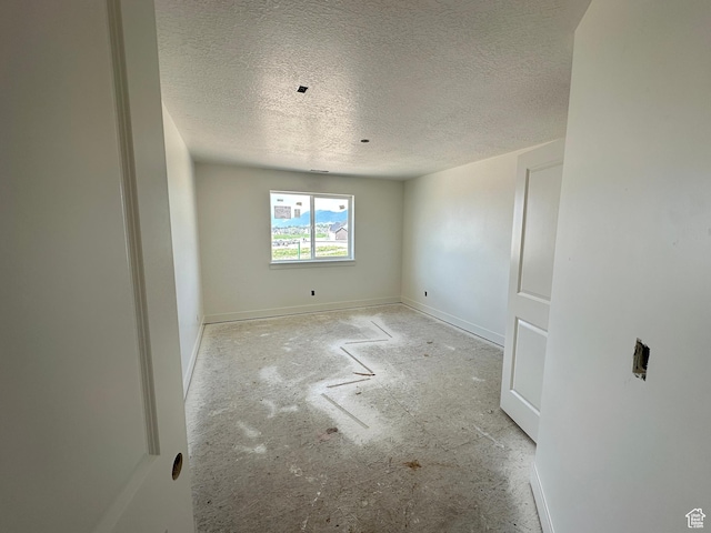 261 E 1150 N Unit 72, Salem, UT 84653 - spare room with a textured ceiling