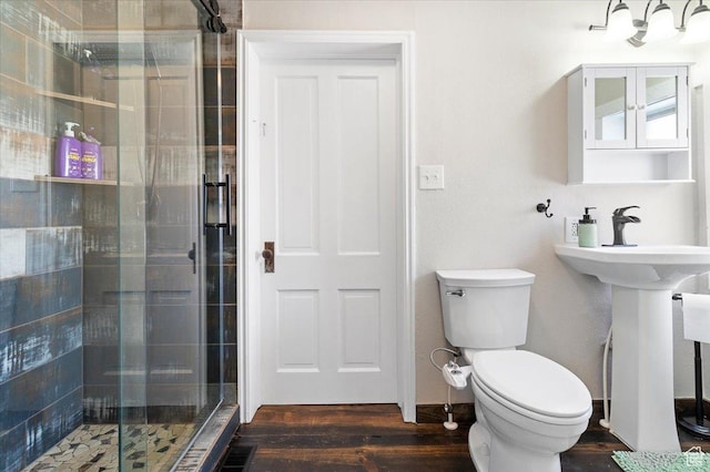 278 S 100 E, Manti, UT 84642 - full bath featuring wood finished floors, visible vents, toilet, and a shower stall