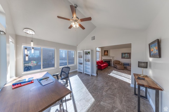 907 W 1840 S Unit B, Syracuse, UT 84075 - office with high vaulted ceiling, visible vents, baseboards, a fireplace, and a ceiling fan