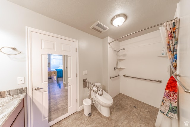 907 W 1840 S Unit B, Syracuse, UT 84075 - bathroom with vanity, toilet, a textured ceiling, visible vents, and curtained shower