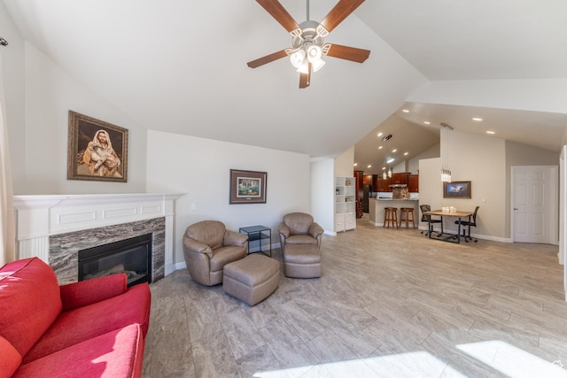 907 W 1840 S Unit B, Syracuse, UT 84075 - living area featuring high vaulted ceiling, a high end fireplace, baseboards, ceiling fan, and recessed lighting