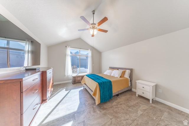 907 W 1840 S Unit B, Syracuse, UT 84075 - bedroom featuring baseboards, vaulted ceiling, and ceiling fan
