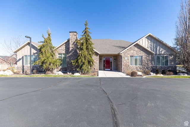 907 W 1840 S Unit B, Syracuse, UT 84075 - craftsman house featuring stone siding, board and batten siding, and a chimney