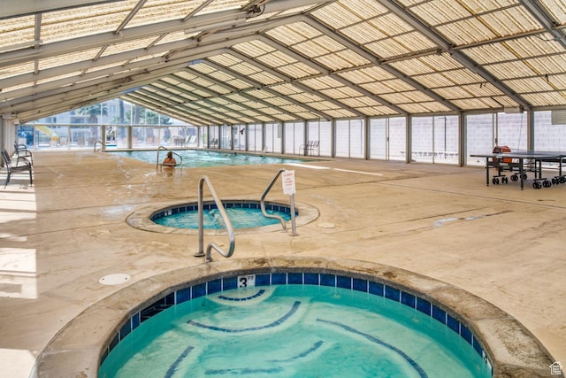 view of pool with an indoor in ground hot tub