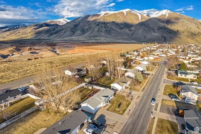 drone / aerial view featuring a mountain view and a residential view
