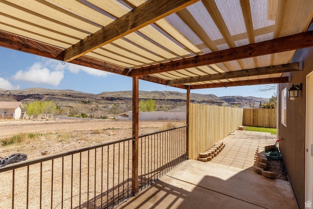 172 W 500 N, Hurricane, UT 84737 - view of patio featuring fence and a mountain view