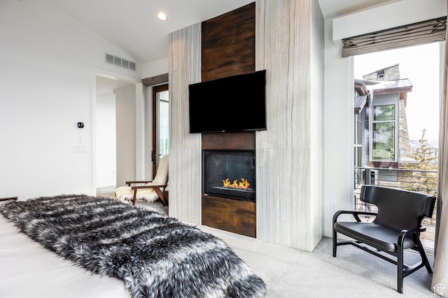 2908 W Deer Pointe Dr, Heber City, UT 84032 - bedroom with a warm lit fireplace, carpet flooring, visible vents, and vaulted ceiling