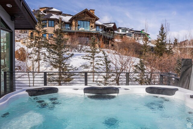 2908 W Deer Pointe Dr, Heber City, UT 84032 - snow covered pool with a hot tub