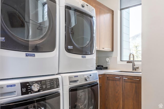 2908 W Deer Pointe Dr, Heber City, UT 84032 - laundry area with stacked washer / drying machine, cabinet space, and a sink