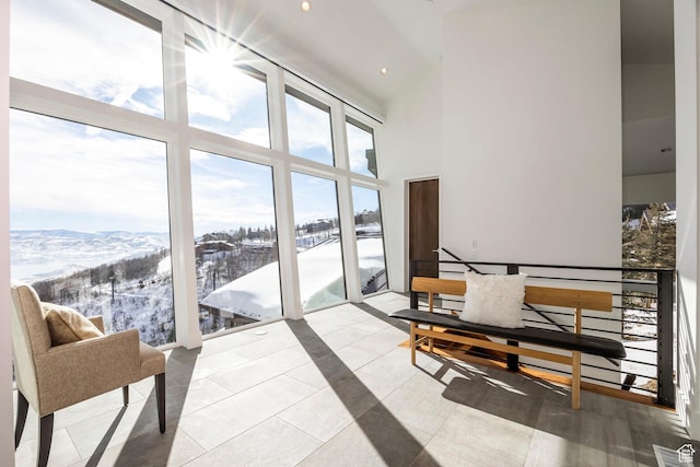 2908 W Deer Pointe Dr, Heber City, UT 84032 - interior space with a high ceiling, tile patterned flooring, a mountain view, and recessed lighting
