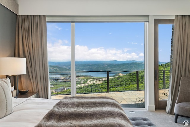 2908 W Deer Pointe Dr, Heber City, UT 84032 - carpeted bedroom with multiple windows and a water and mountain view