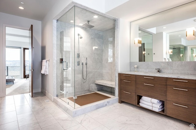 2908 W Deer Pointe Dr, Heber City, UT 84032 - bathroom featuring baseboards, marble finish floor, recessed lighting, vanity, and a stall shower