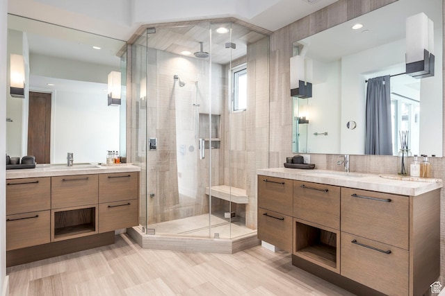 2908 W Deer Pointe Dr, Heber City, UT 84032 - bathroom with a shower stall, two vanities, recessed lighting, and backsplash