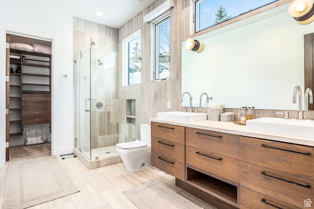 2908 W Deer Pointe Dr, Heber City, UT 84032 - full bathroom with a shower stall, a spacious closet, and double vanity