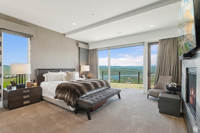 2908 W Deer Pointe Dr, Heber City, UT 84032 - bedroom with carpet, a lit fireplace, access to outside, and recessed lighting