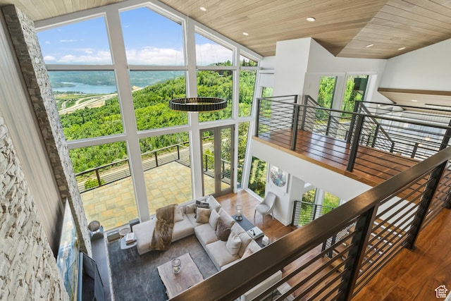 2908 W Deer Pointe Dr, Heber City, UT 84032 - stairs featuring a water view, wooden ceiling, vaulted ceiling, wood finished floors, and recessed lighting