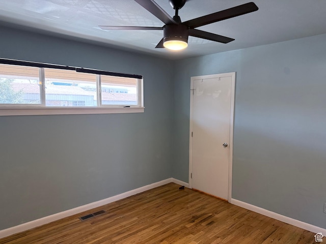 650 N 300 W Unit 234, Salt Lake City, UT 84103 - unfurnished room with baseboards, visible vents, wood finished floors, and ceiling fan