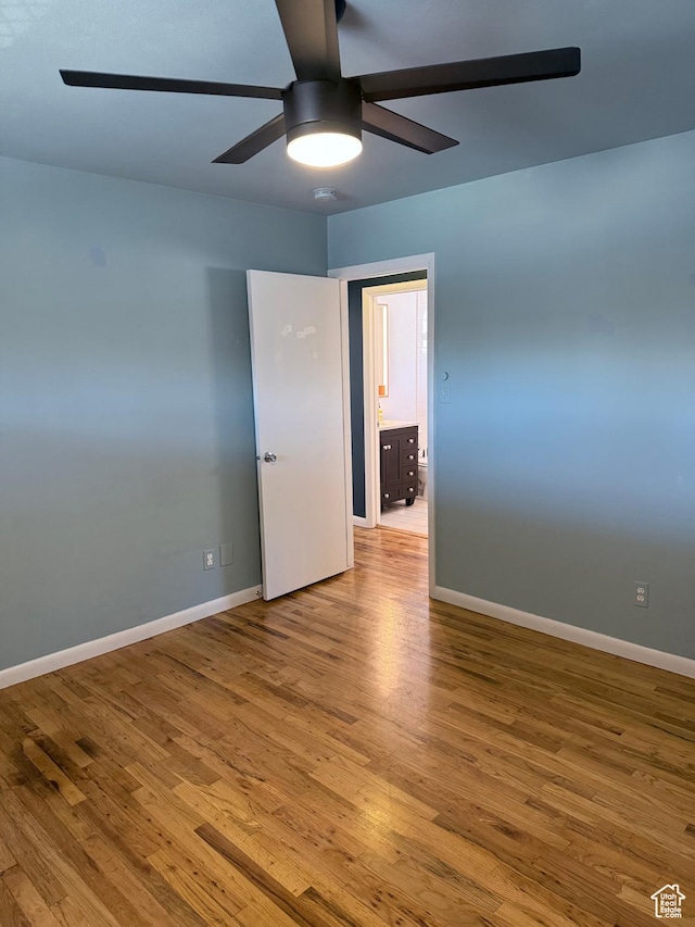 650 N 300 W Unit 234, Salt Lake City, UT 84103 - unfurnished room featuring baseboards, wood finished floors, and ceiling fan
